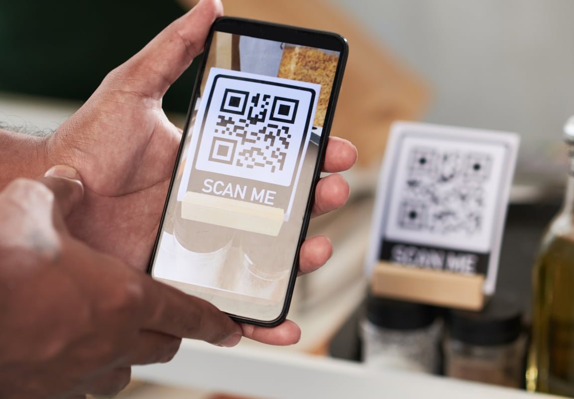 customer taking photo of product with phone